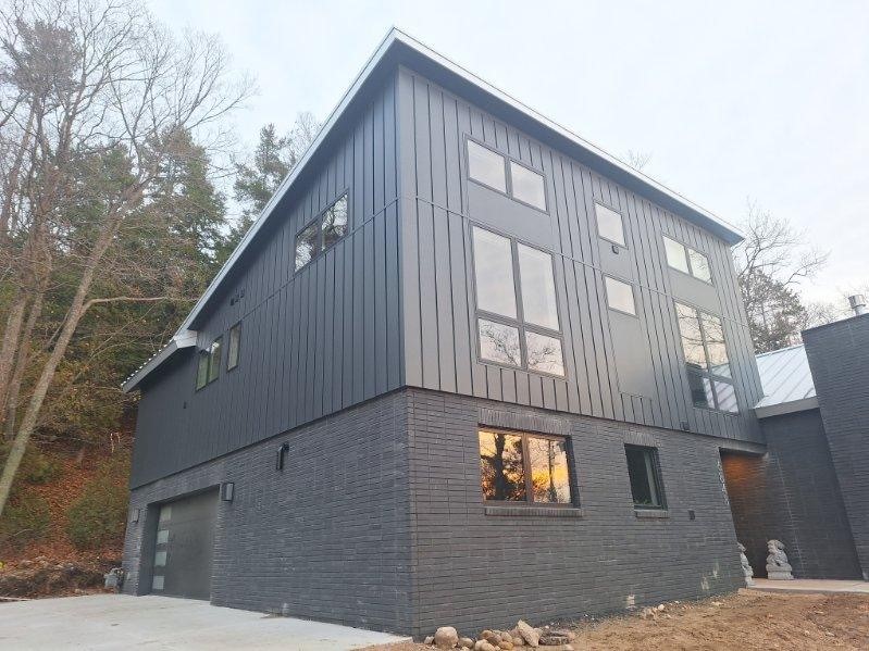 Discover Northern Michigan's Premier Custom Siding Selection: Vinyl, Fiber Cement, Composite Wood, and Steel - Uniting Beauty with Enduring Quality